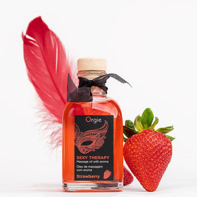 Main image for product index 4: Набір для масажу Orgie – Sexy Therapy Strawberry, їстівна розігрівальна олія + пір’їнка